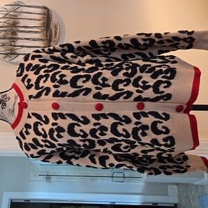 Chunky Cardigan in black beige burnout acrylic knit with red buttons Sweater